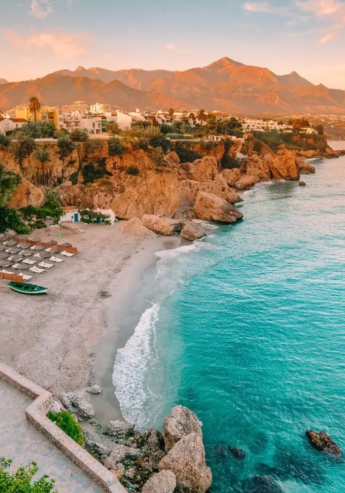Sunset over a Costa del Sol beach in Spain, a popular destination wedding setting